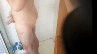 Man wanks cock in shower on hidden cam